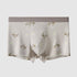 Gray men's boxer briefs with geometric pattern and metallic gold accents, premium cotton fabric