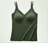 Seamless camisole in deep green with built-in bra, featuring scalloped edges and soft fabric.