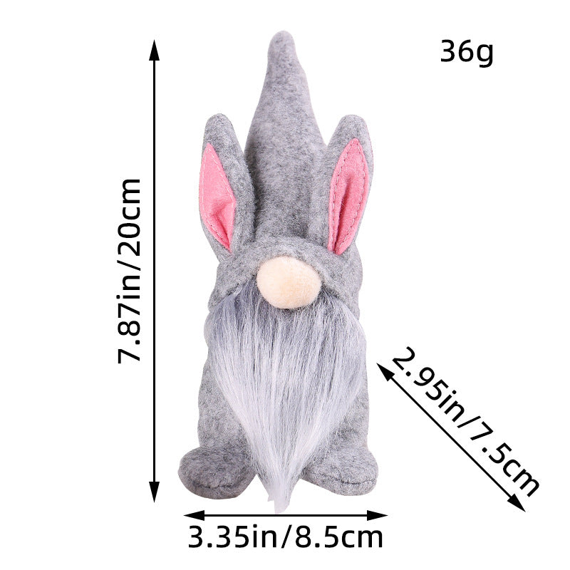 Gray Easter gnome plush with long beard and pink bunny ears, with dimensions of 7.87 inches height and 36g weight displayed.