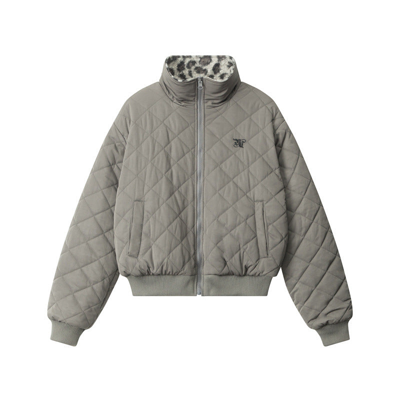 A light gray quilted bomber jacket with snow leopard print collar lining, featuring side pockets and ribbed hem photographed against white background