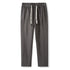 Gray pants with white drawstring and elastic waistband