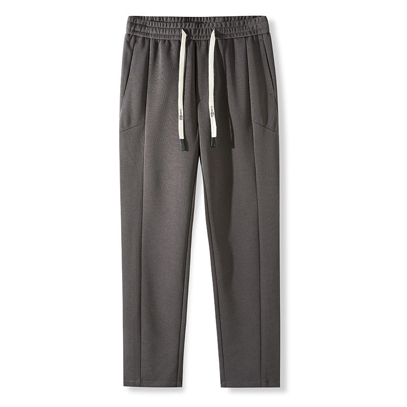 Gray pants with white drawstring and elastic waistband