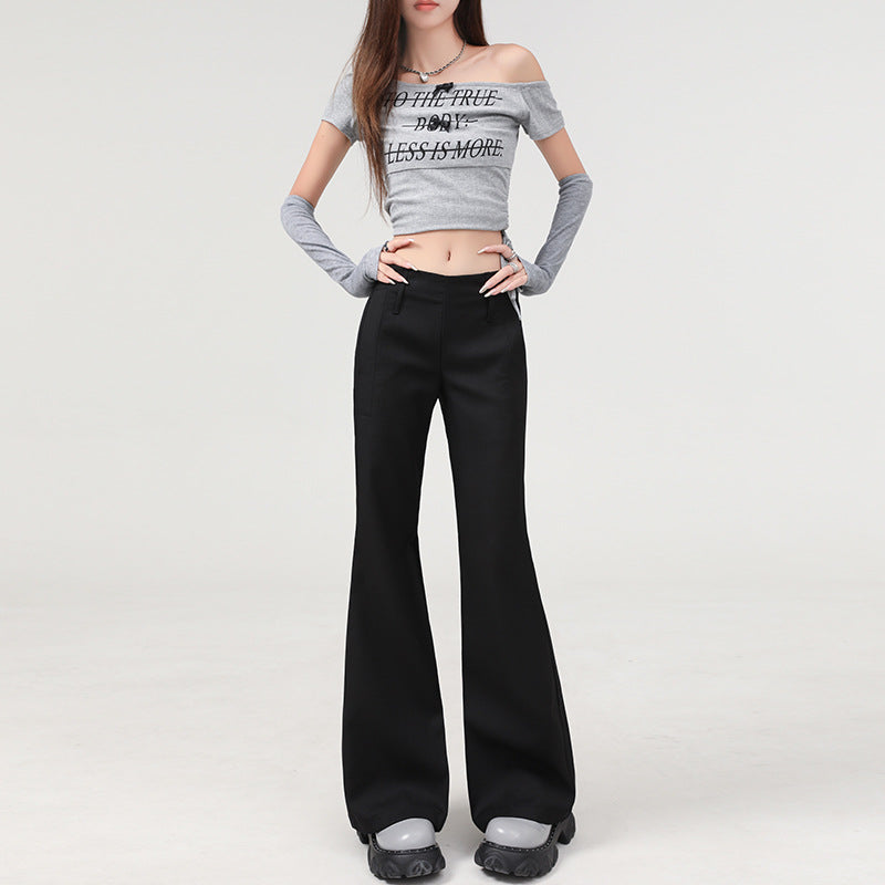 Front view, full-body shot of black flare trousers styled for casual streetwear.