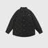 Black quilted shirt jacket with collar and small mountain logo displayed flat against light gray background