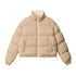 Beige puffer jacket with a high collar and white zipper displayed against a white background