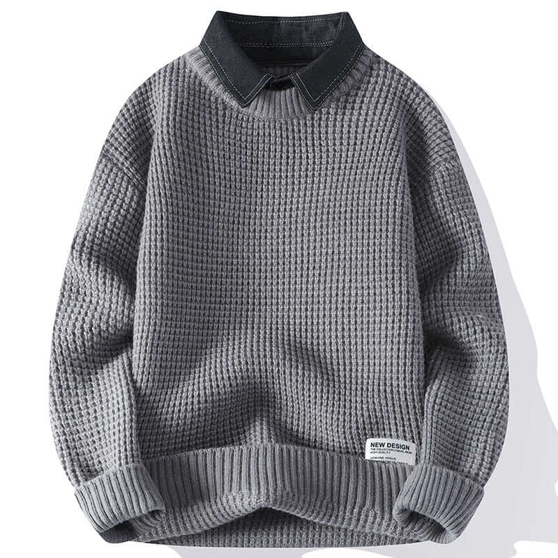 Light gray waffle-knit sweater with black collar and brand label