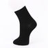 Black ankle sock displayed on a mannequin foot