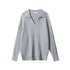 Grey V-neck polo sweater with all-over cable knit pattern and ribbed trim.