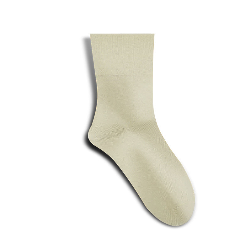 A single cream colored crew sock displayed against white background, showing smooth seamless construction and mid-calf length