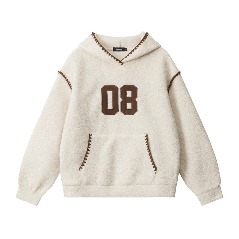 Cream textured hoodie with brown '08' varsity appliqué, brown whipstitch detailing on hood and pocket edges, and ribbed hem and cuffs. Nariele brand label visible