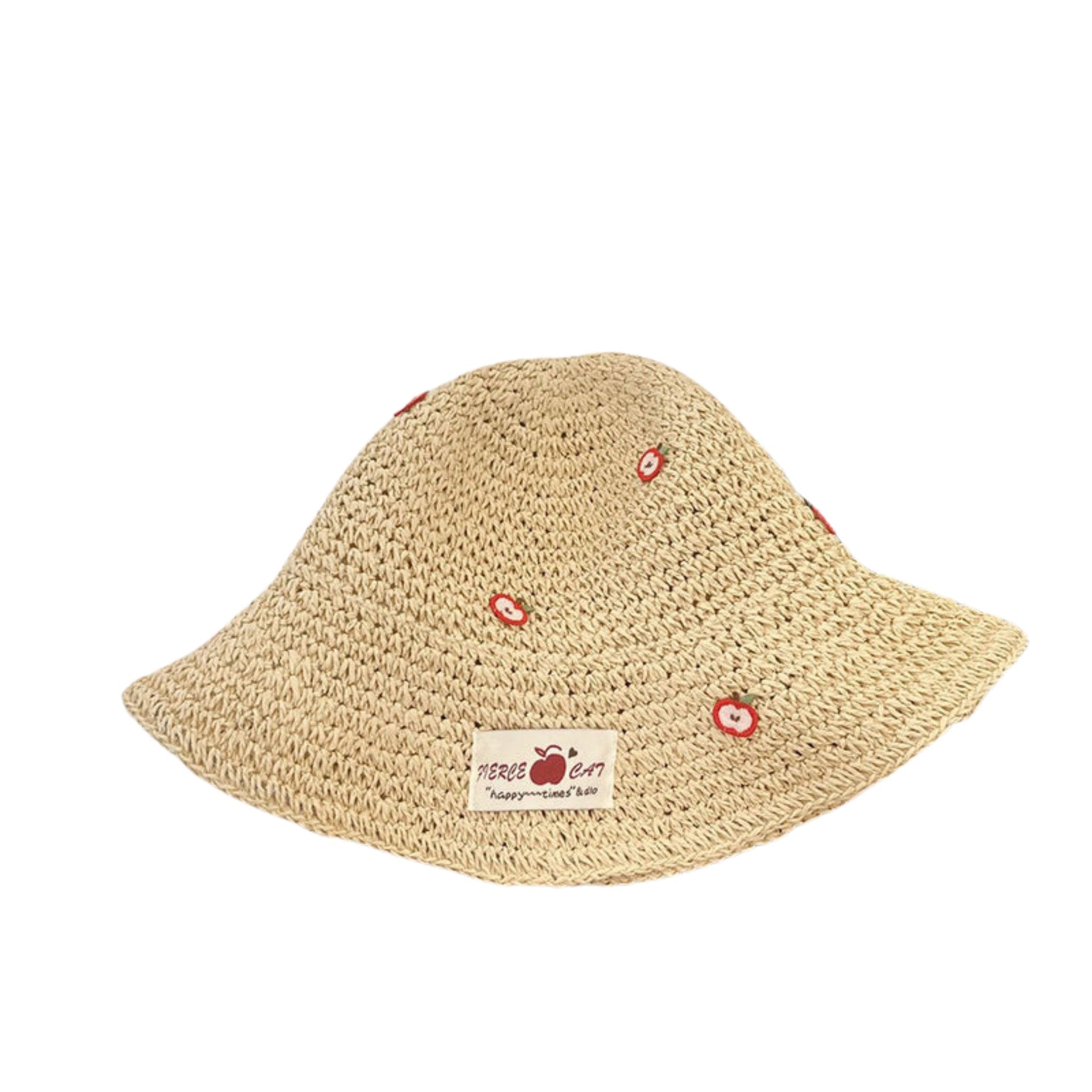 Beige woven straw bucket hat with embroidered apple details and a fabric label, displayed on a white background.