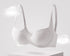Minimalist showcase of a seamless silver colored push-up bra with under-cup sculpting and adjustable straps.