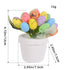 A close-up of a white ceramic pot filled with multicolored artificial eggs, with measurement annotations showing the height and width of the decorative item.