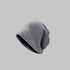 Heather gray beanie with slouchy silhouette and subtle brand detail