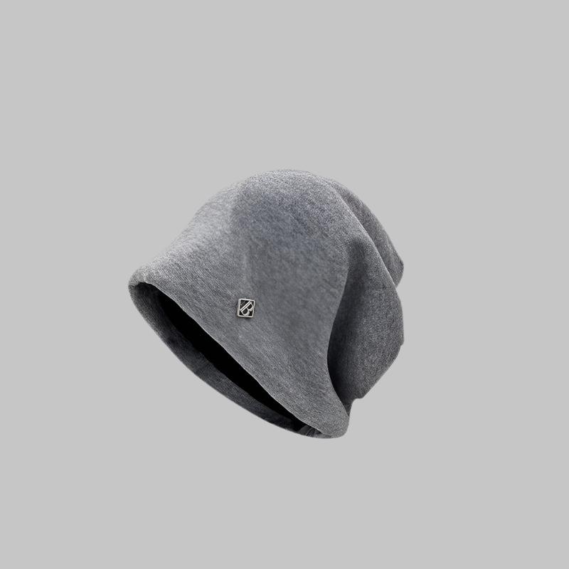 Heather gray beanie with slouchy silhouette and subtle brand detail