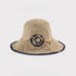  A beige woven sun hat with a navy crochet flower accent, offering a classic summer look with a flexible brim.