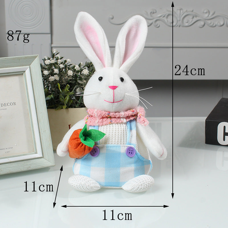 White plush bunny in blue checkered overalls, holding a fabric carrot, with size dimensions labeled at 24cm height and 11cm width.