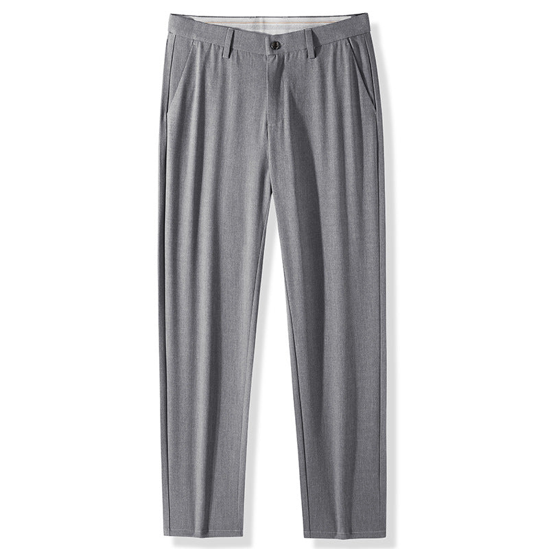 Gray dress pants with pleated front and single button closure against white background
