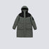 Product shot of gray/black technical parka with hood up displaying front pockets and sleeve patch against light gray background