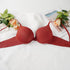 Terracotta red push-up bra with roses and pearls showcasing comfortable design