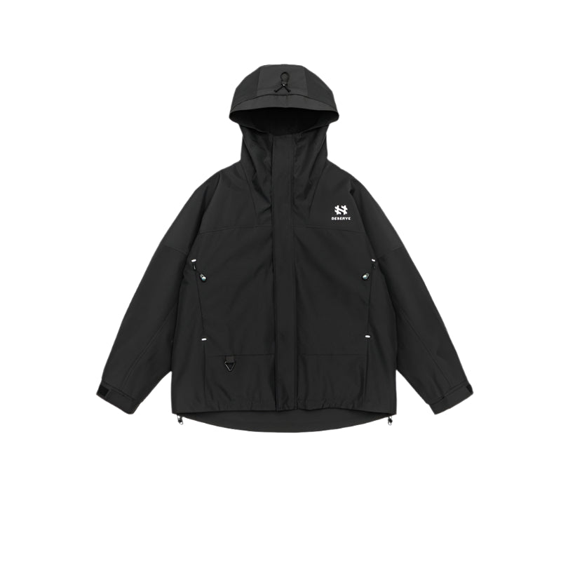 Front view of black technical jacket with hood emblem and zipper pockets