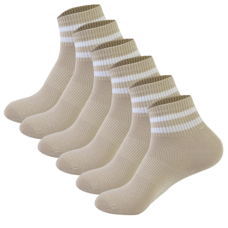 Six-pack of beige ankle socks with white striped cuffs, displayed in a row showing ribbed texture and heel detail