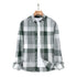 Gray and white large plaid shirt with button-down collar. Partially unbuttoned showing white undershirt