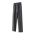 Charcoal sweatpants with elastic waistband and white drawstring, featuring relaxed fit and straight leg design