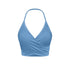 Baby blue wrap halter crop top with ruched sides and seamless stretch fabric