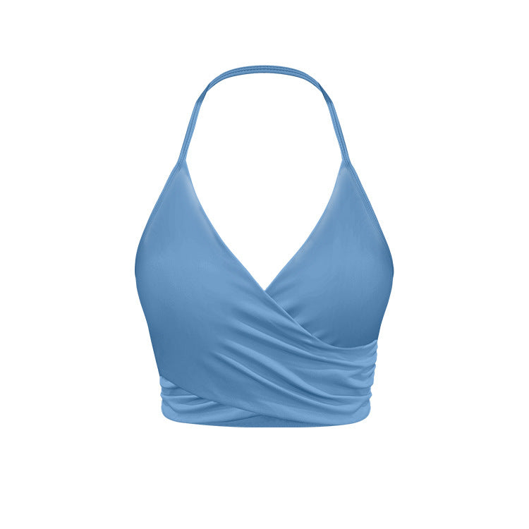 Baby blue wrap halter crop top with ruched sides and seamless stretch fabric