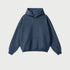Navy blue oversized hoodie with front pocket on light gray background