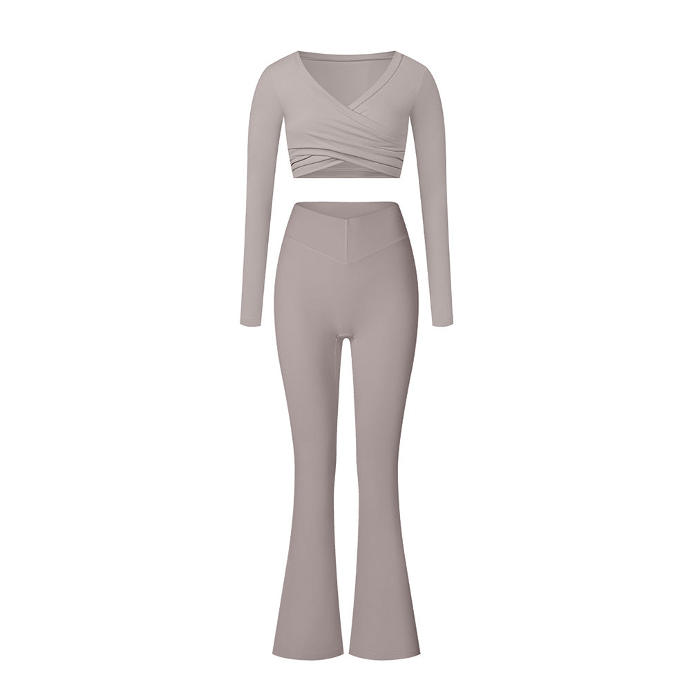 Gray athletic set with long sleeve wrap top and flared pants, showing full-length silhouette
