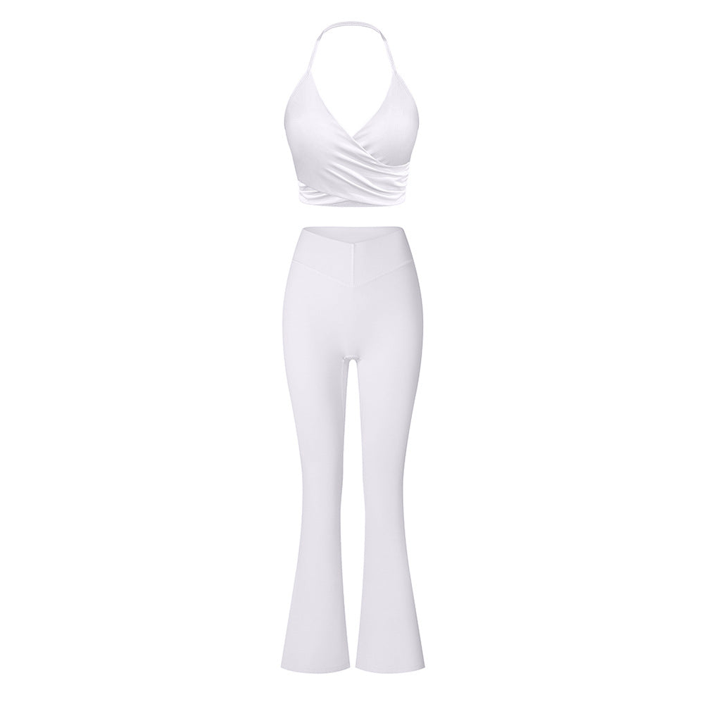 White halter top and flared pants set, showing elegant design and stretch fabric detail