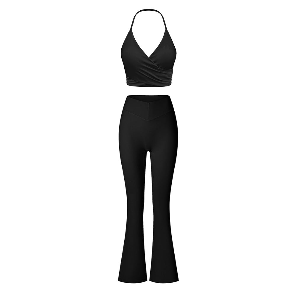 Black halter top and flared pants set, featuring classic design and high-waisted fit