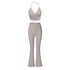 Gray/taupe halter neck workout set with ruched wrap sports bra and flared leggings featuring high-waist compression fit