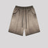 Light gray ombré washed cotton shorts with darker waistband displayed flat against light gray background