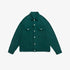 Forest green denim jacket with silver buttons and dual chest pockets displayed flat against white background