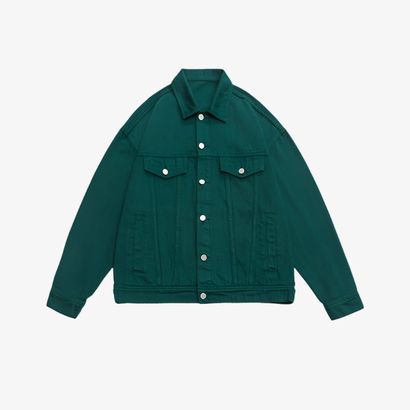 Forest green denim jacket with silver buttons and dual chest pockets displayed flat against white background