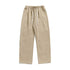 A pair of beige wide-leg drawstring pants with an elastic waistband and white drawstrings, displayed flat on a white background