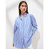 Woman wearing blue and white vertical striped button-up shir