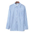 Blue and white striped button-down shirt on wooden hanger