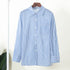 Blue and white striped button-up shirt on wooden hanger