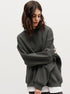 Forest green oversized sweatshirt with ribbed cuffs and dropped shoulders