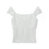 White ribbed knit crop top with cap sleeves and sweetheart neckline featuring small bow trim detail displayed against white background