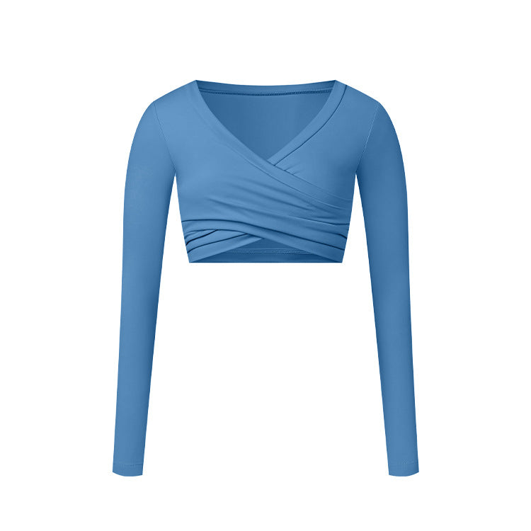 A powder blue long-sleeve wrap crop top with V-neckline and crossed front detail, shown flat against white background