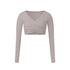 A light gray long-sleeve wrap crop top with V-neckline and crossed ruching detail, shown flat against white background