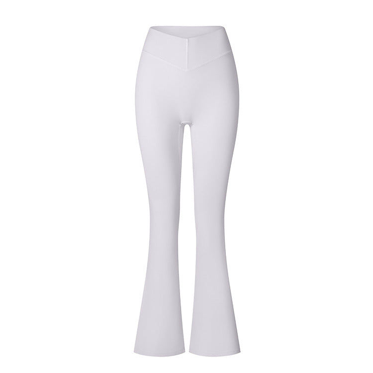 White high-waisted flared leggings with seamless design and V-shaped waistband, flat lay on white background