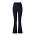 Black flared yoga pants featuring high waist and V-shaped panel detail, displayed against white backdrop