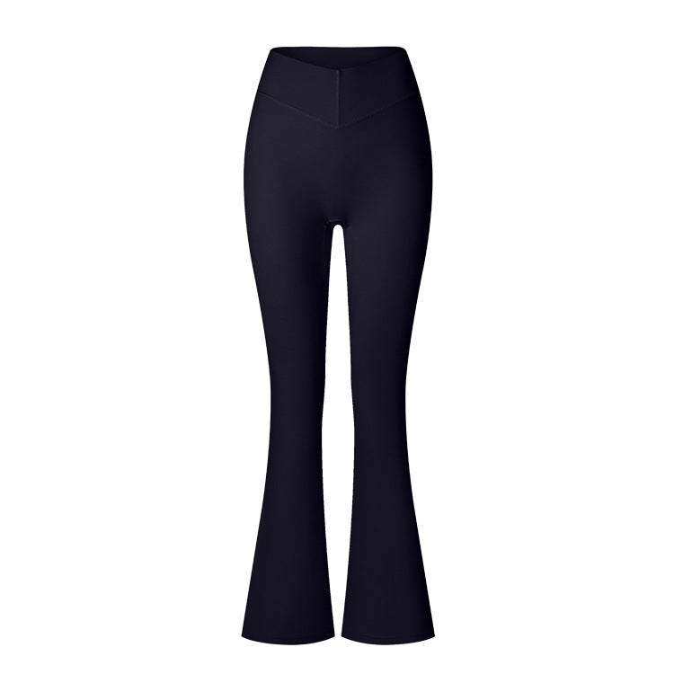 Black flared yoga pants featuring high waist and V-shaped panel detail, displayed against white backdrop