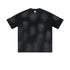 Black t-shirt with chest pocket and subtle distressed details on white background